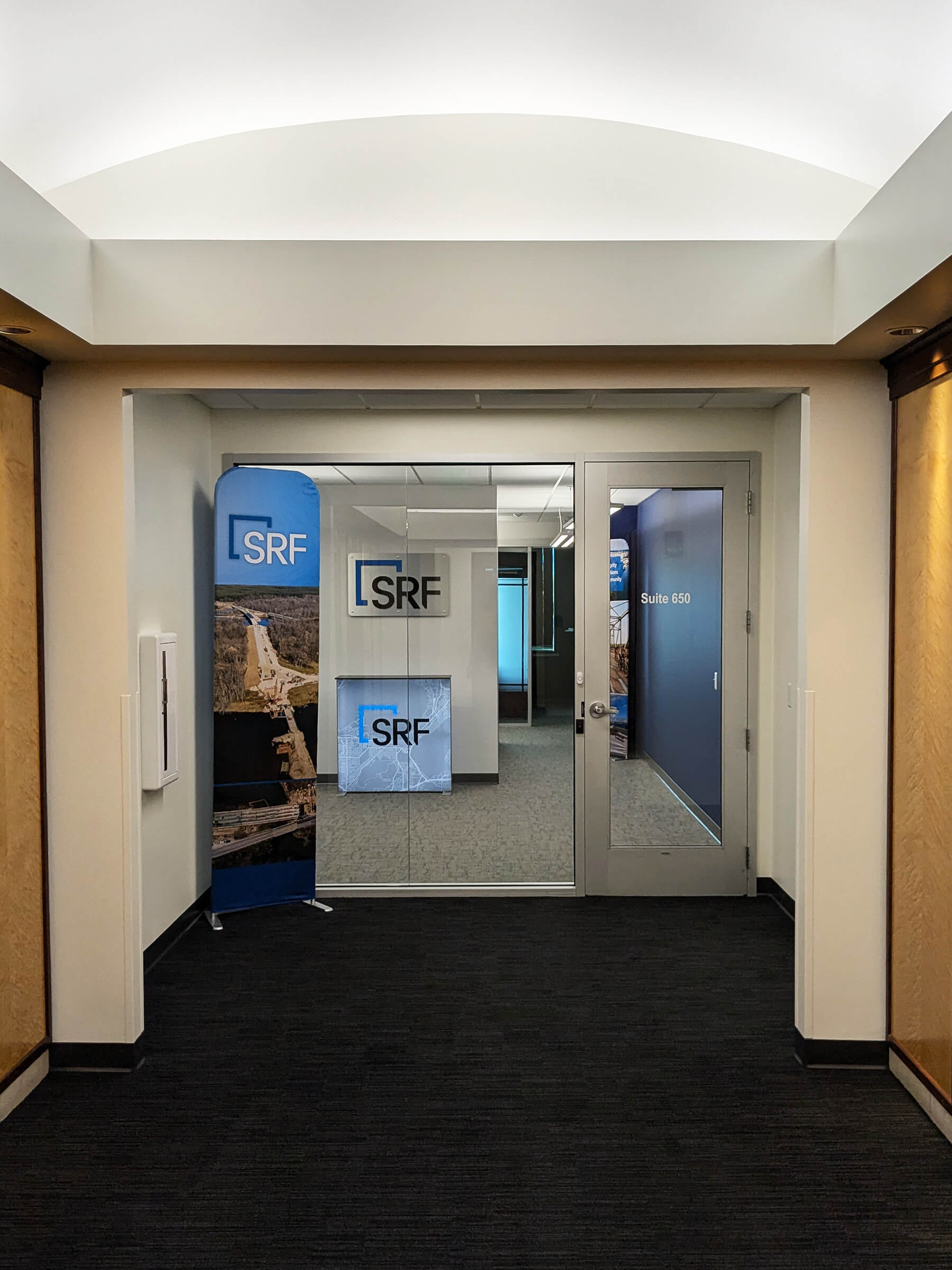 Entrance of SRF Consulting’s Madison office at 1600 Aspen Commons, Suite 650, Middleton, WI 53562, representing the firm’s engineering and design services.